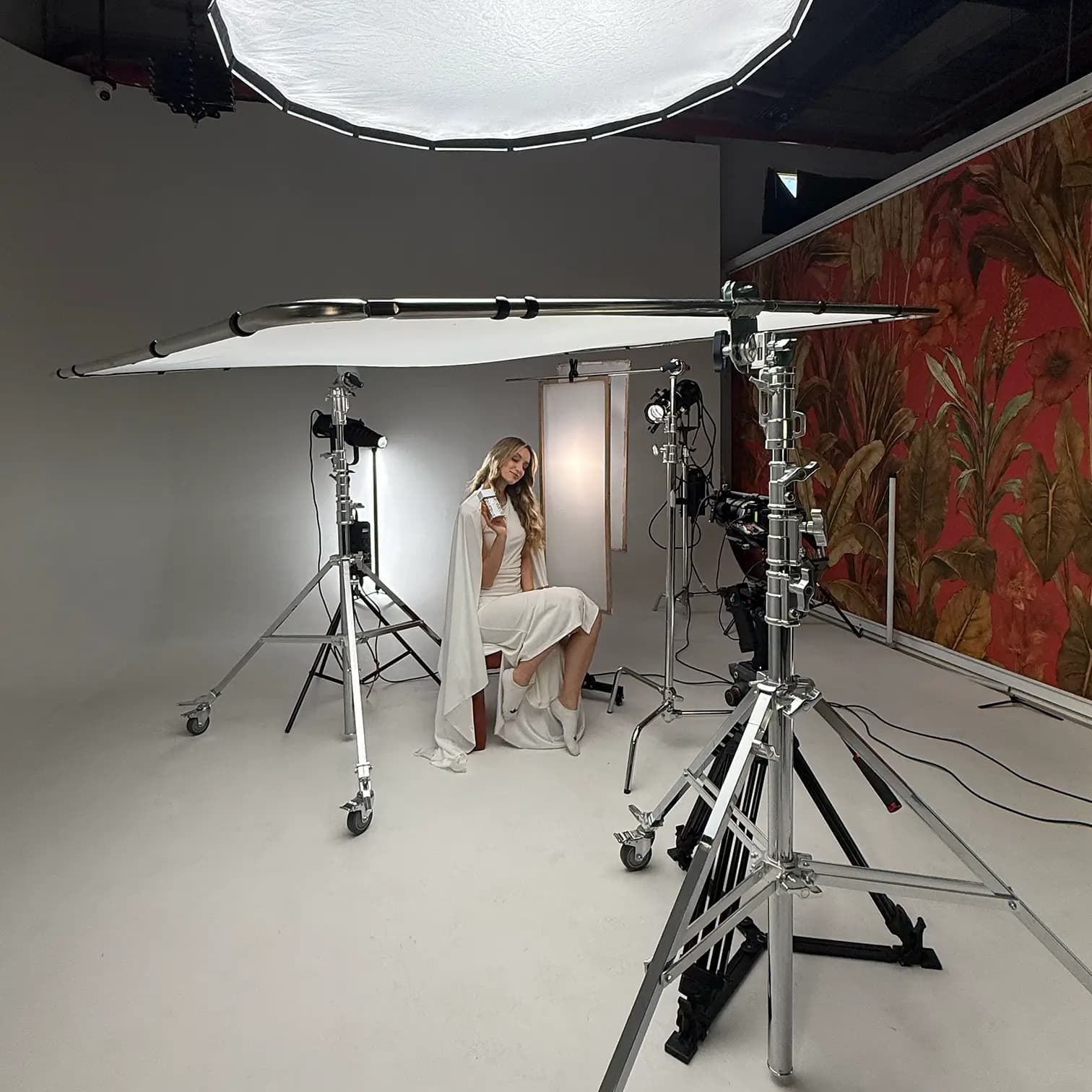 A shoot in the studio with lights, C-stands and a camera rig